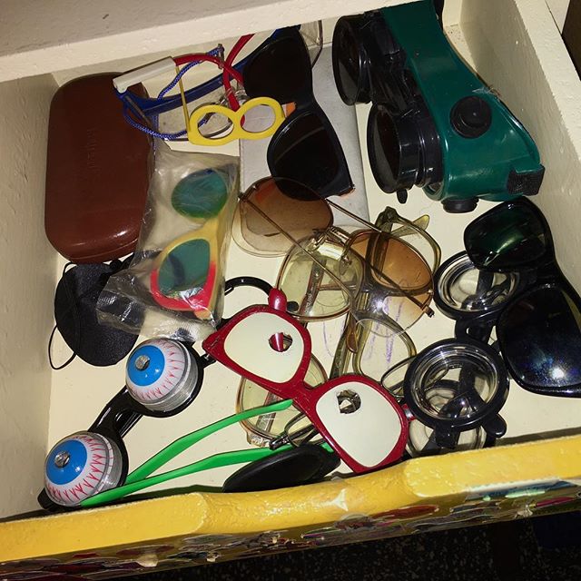 PHOTO EVIDENCE: This is a drawer of comical eye glasses I have instead of a wife. #honesty #chrisweagel #weagelshow #eyewear #vision #humandog